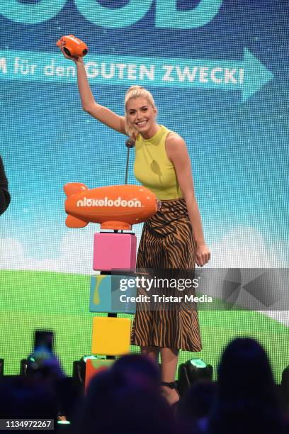 Lena Gercke is seen on stage at the Nickelodeon Kids Choice Awards on April 4, 2019 in Rust, Germany.