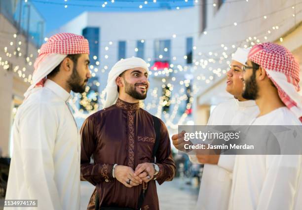 middle eastern group of young men together - bahrain people stock pictures, royalty-free photos & images