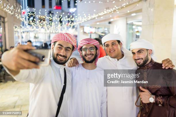 selfie of cheerful group of people - amman people stock pictures, royalty-free photos & images