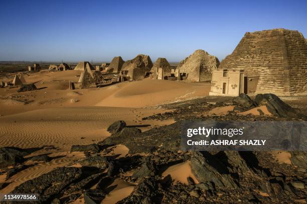 Picture taken on April 4, 2019 shows a partial view of the Meroe pyramids, which hold burial chambers for Kushite kings and queens whose rule spanned...