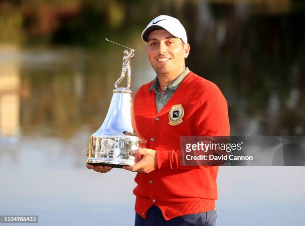 Francesco Molinari of Italy holds the trophy after his three shot win in the final round of the 2019 Arnold Palmer Invitational at the Arnold Palmer...