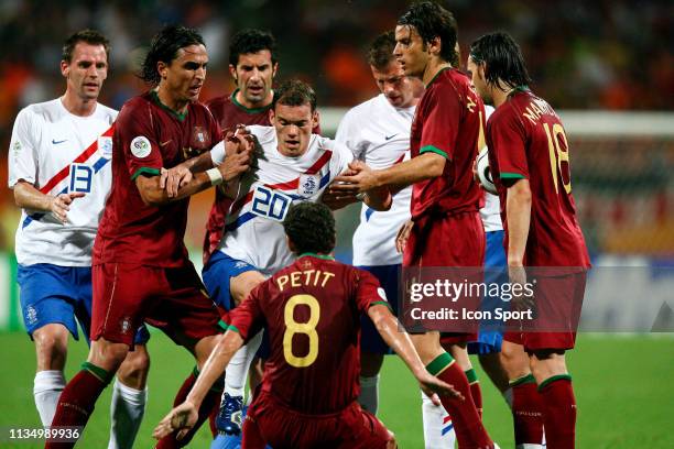 Echauffourée Wesley SNEIJDER / PETIT during FIFA world cup match between Netherlands and Portugal at Frankenstadion, Nuremberg, Germany on 25th June...