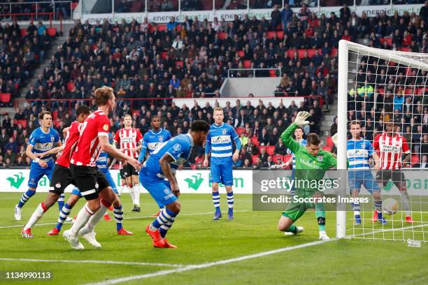 Luuk de Jong of PSV scores his goal to make it 3-0, Darryl Lachman of PEC Zwolle, Mickey van der Hart of PEC Zwolle during the Dutch Eredivisie match...