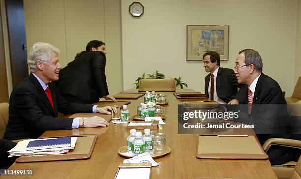 Former U.S. President William Jefferson Clinton meets with UN Secetary General Ban-KI Moon at the United Nations in New York City on April 12, 2007