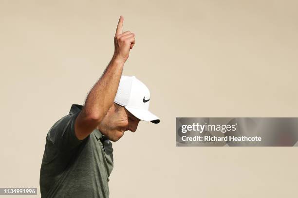 Francesco Molinari of Italy celebrates making a putt for birdie on the 18th hole during the final round of the Arnold Palmer Invitational Presented...