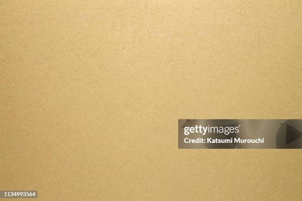 gold paper texture background - gold stock pictures, royalty-free photos & images
