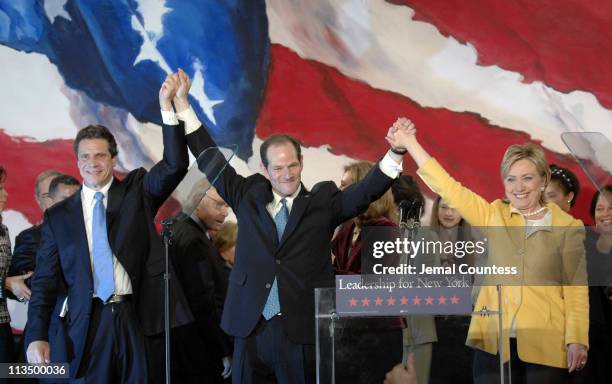 Andrew Cuomo, Eliot Spitzer and Hillary Rodham Clinton celebrate with the crowd of Democratic supporters following their wins in their various races...