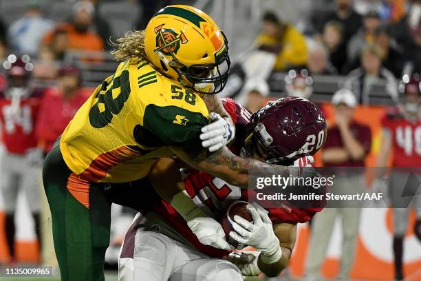 Scooby Wright of the Arizona Hotshots tackles Kenneth Farrow II of the San Antonio Commanders in the third quarter during the Alliance of American...