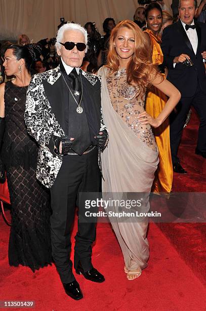 Designer Karl Lagerfeld and actress Blake Lively attend the "Alexander McQueen: Savage Beauty" Costume Institute Gala at The Metropolitan Museum of...