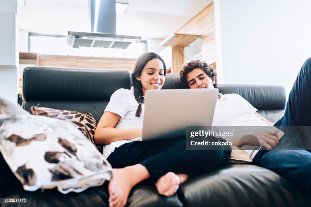 Brother and sister bonding using notebook
