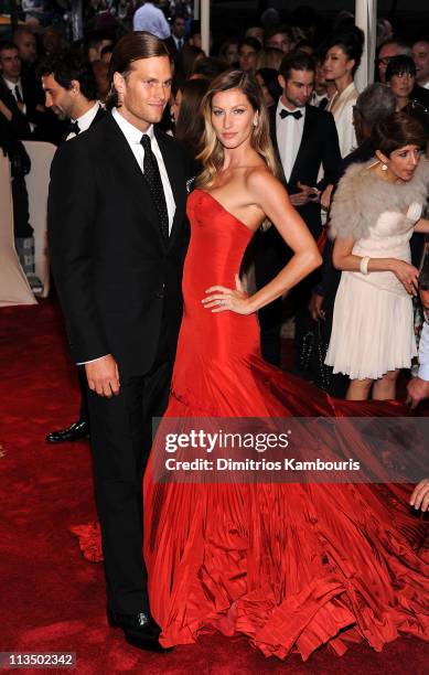 Model Gisele Bundchen and NFL player Tom Brady attends the "Alexander McQueen: Savage Beauty" Costume Institute Gala at The Metropolitan Museum of...