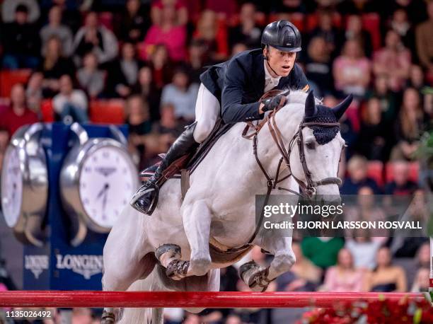 Austria's Max Kuehner rides Chardonnay 79 during the FEI World Cup Final 2 show jumping event at Gothenburg Horse Show in Scandinavium Arena April 5,...