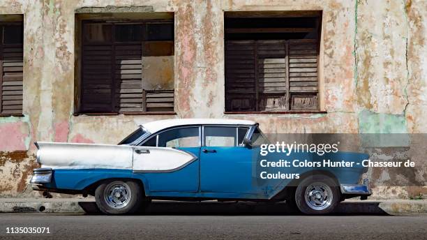 an oldsmobile parked on an havana street - havana pattern stock pictures, royalty-free photos & images