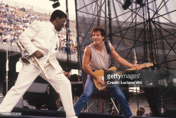 Street Band saxophone player Clarence Clemons and singer-songwriter Bruce Springsteen performing in Milan, Italy, 1985.