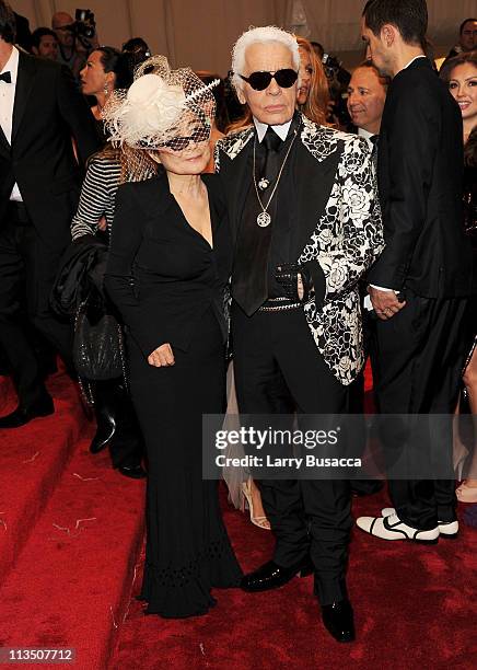Yoko Ono and designer Karl Lagerfeld attend the "Alexander McQueen: Savage Beauty" Costume Institute Gala at The Metropolitan Museum of Art on May 2,...