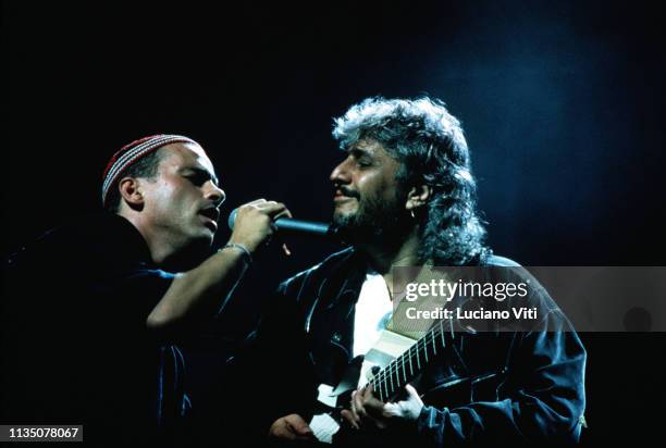 Italian singers Eros Ramazzotti and Pino Daniele performing in Rome, Italy, 1994.
