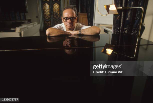 Italian music composer Ennio Morricone in his house, Rome, Italy, 1987.