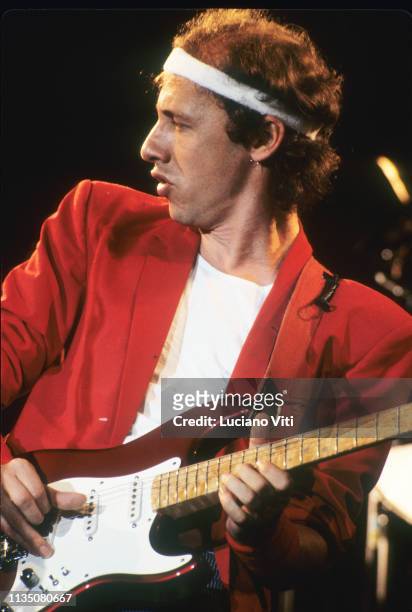Mark Knopfler, lead guitarist, vocalist and songwriter of British rock band Dire Straits, performing in Rome, Italy, 1983.