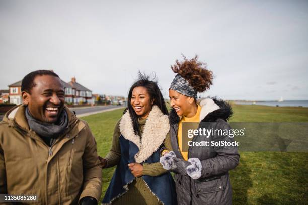 catching up with family - beach england stock pictures, royalty-free photos & images