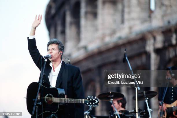 Italian singer-songwriter Claudio Baglioni performing in front of Colosseum, Rome, Italy, 1996.