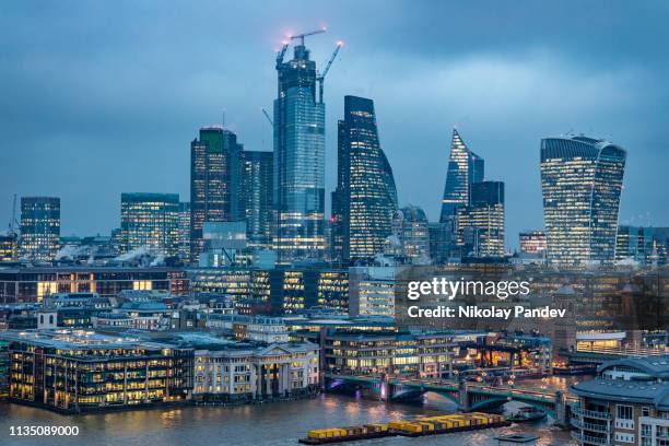 london city's financial district skyline during blue hour - stock image - 2019 stock pictures, royalty-free photos & images