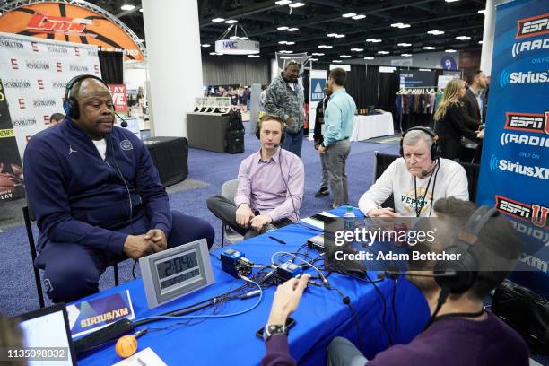 April 05: SiriusXM guest Patrick Ewing is interviewed during the NCAA final Four radio broadcast on radio row at the Minneapolis Convention Center on...