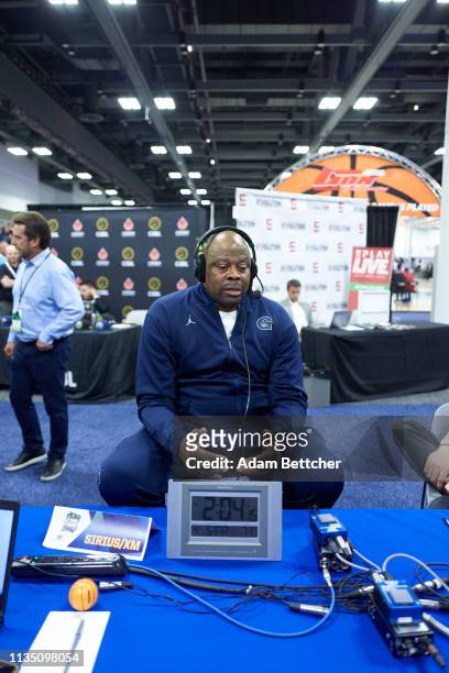 April 05: SiriusXM guest Patrick Ewing is interviewed during the NCAA final Four radio broadcast on radio row at the Minneapolis Convention Center on...