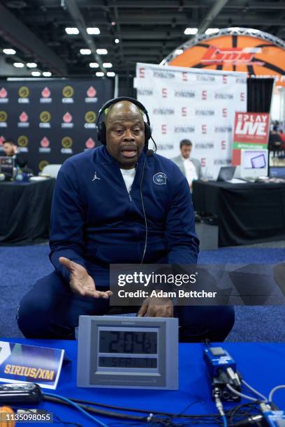 April 05: SiriusXM guest Patrick Ewing is interviewed during the NCAA final Four radio broadcast on radio row at the Minneapolis Convention Center on...