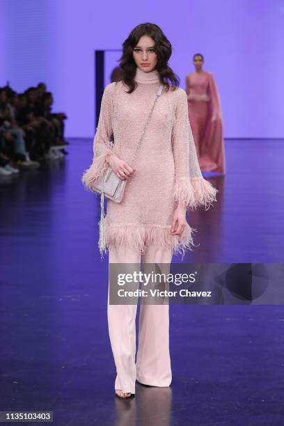 Model walks the runway during the Benito Santos fashion show as part of the Mercedes-Benz Fashion Week Mexico Fall/Winter 2019 - Day 5 at Fronton...