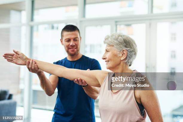 perfect - physiotherapy shoulder stock pictures, royalty-free photos & images