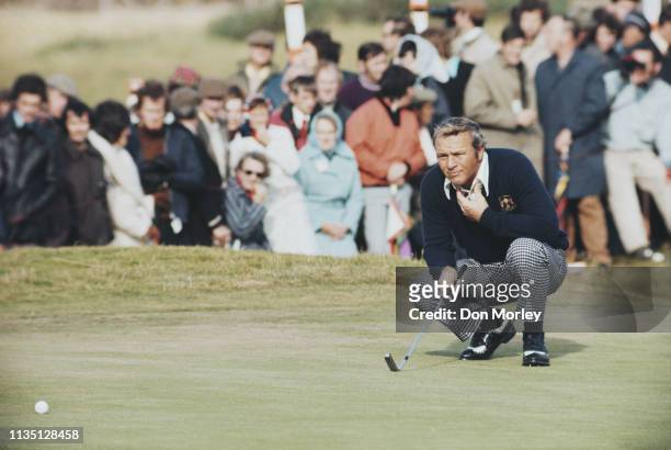 Arnold Palmer of the United States follows his ball onto the green during the Four ball competition of the 20th Ryder Cup Matches against the United...