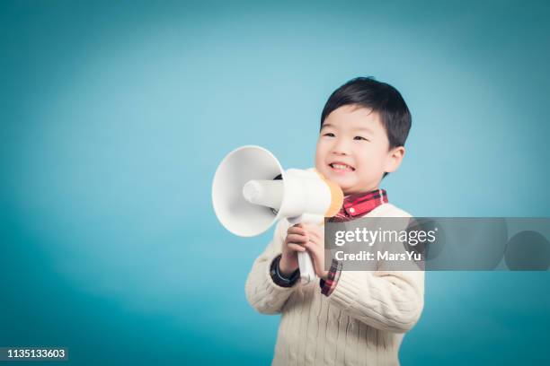 Kid Announcing Using 310 Kids Making Noise Stock Photos, High-Res Pictures, and Images ...
