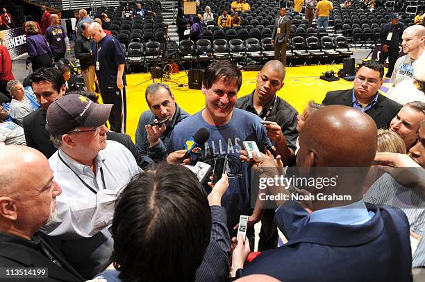 Owner Mark Cuban of the Dallas Mavericks fields questions from the media before taking on the Los Angeles Lakers in Game One of the Western...