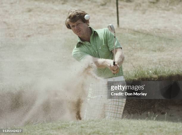 Tom Watson of the United States hitting out of a bunker during the 106th Open Championship on 9th July 1977 on the Ailsa Course at the Turnberry Golf...