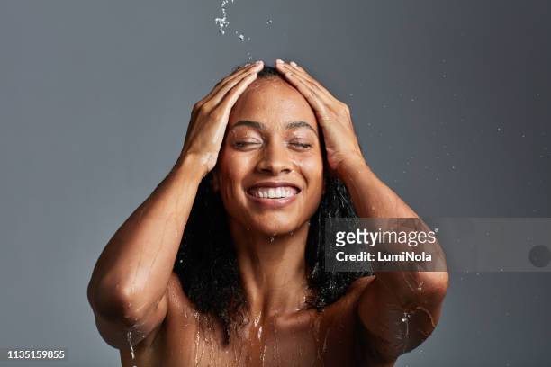 time to freshen up - women taking showers stock pictures, royalty-free photos & images