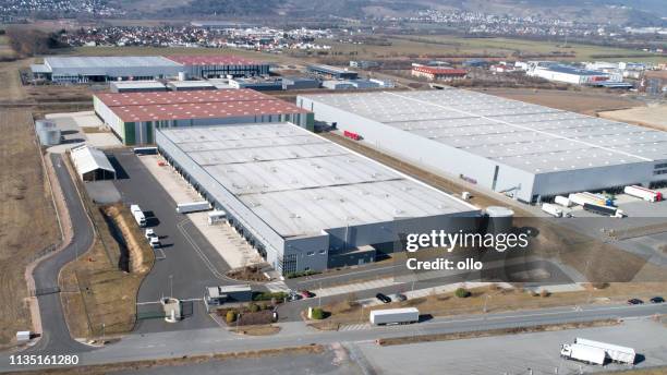 large industrial buildings roofs and trucks - image hub stock pictures, royalty-free photos & images