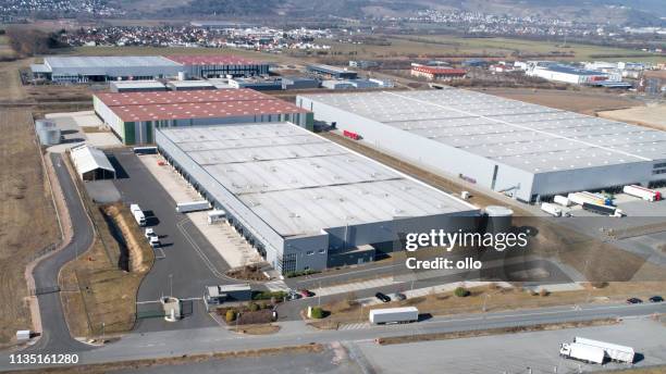 large industrial buildings roofs and trucks - overlooking factory stock pictures, royalty-free photos & images