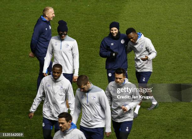 Domenico Tedesco, Manager of FC Schalke 04 and Rabbi Matondo of FC Schalke 04 speak during a training session ahead of their UEFA Champions League...