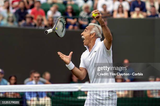 Mansour Bahrami of France along with his partner Goran Ivanisevic of Croatia entertaining the crowd during the Gentlemen's Senior Invitation Doubles...