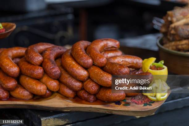 sausages at christmas market (hungary) - christmas bbq stock pictures, royalty-free photos & images