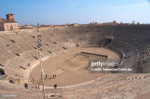 arena in verona italy, discovering italy - stadium or arena or coliseum or colosseum or ring exterior or outdoor stock-fotos und bilder