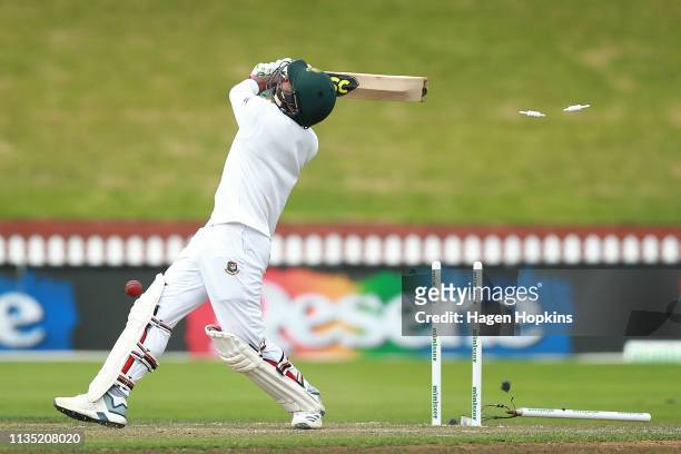 Mustafizur Rahman of Bangladesh is bowled out by Trent Boult of New Zealand during day five of the second test match in the series between New...