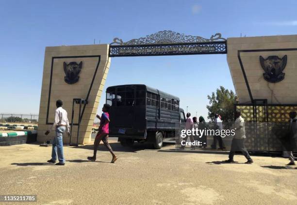 Sudanese police arrive at Khartoum airport on April 6, 2019. - Protests have rocked the east African country since December, with angry crowds...