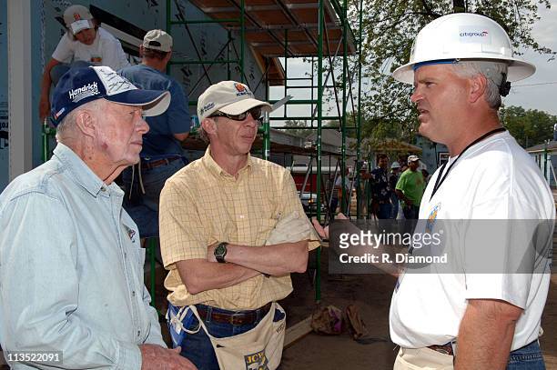 Former President Jimmy Carter, Jeff Carter and Robert A. Niblock, chairman/CEO of Lowes