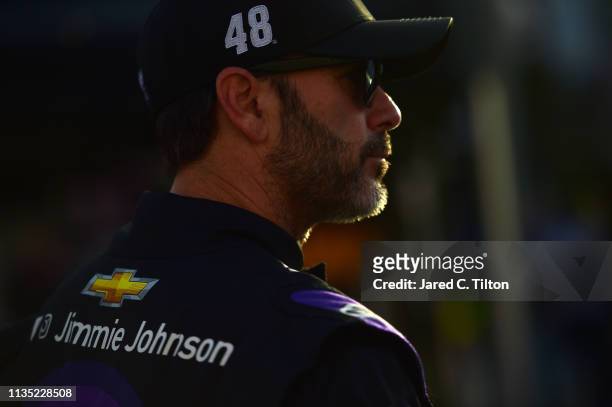 Jimmie Johnson, driver of the Ally Chevrolet, stands in the garage area during practice for the Monster Energy NASCAR Cup Series Food City 500 at...