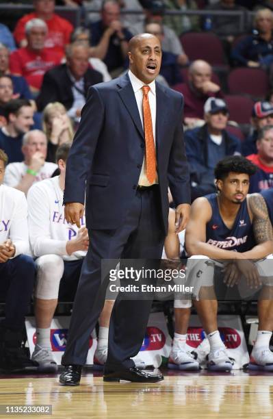 Head coach Lorenzo Romar of the Pepperdine Waves looks on during a semifinal game of the West Coast Conference basketball tournament against the...