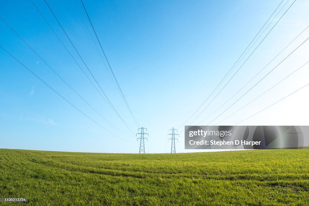 Pylons and power lines in UK field