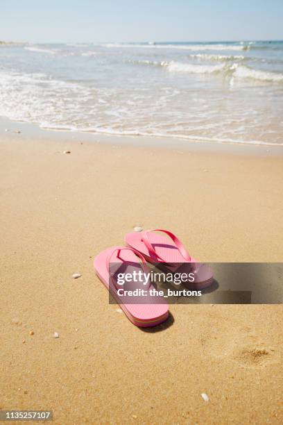 Beach Flip Flops Photos and Premium High Res Pictures - Getty Images