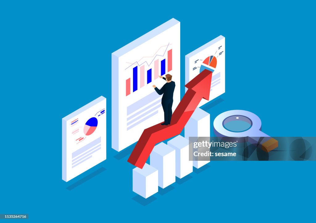 Businessman standing on arrow analyzing page data
