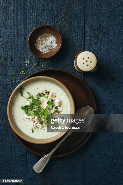 creamy caulflower and broccoli with feta soup - cauliflower bowl stock pictures, royalty-free photos & images